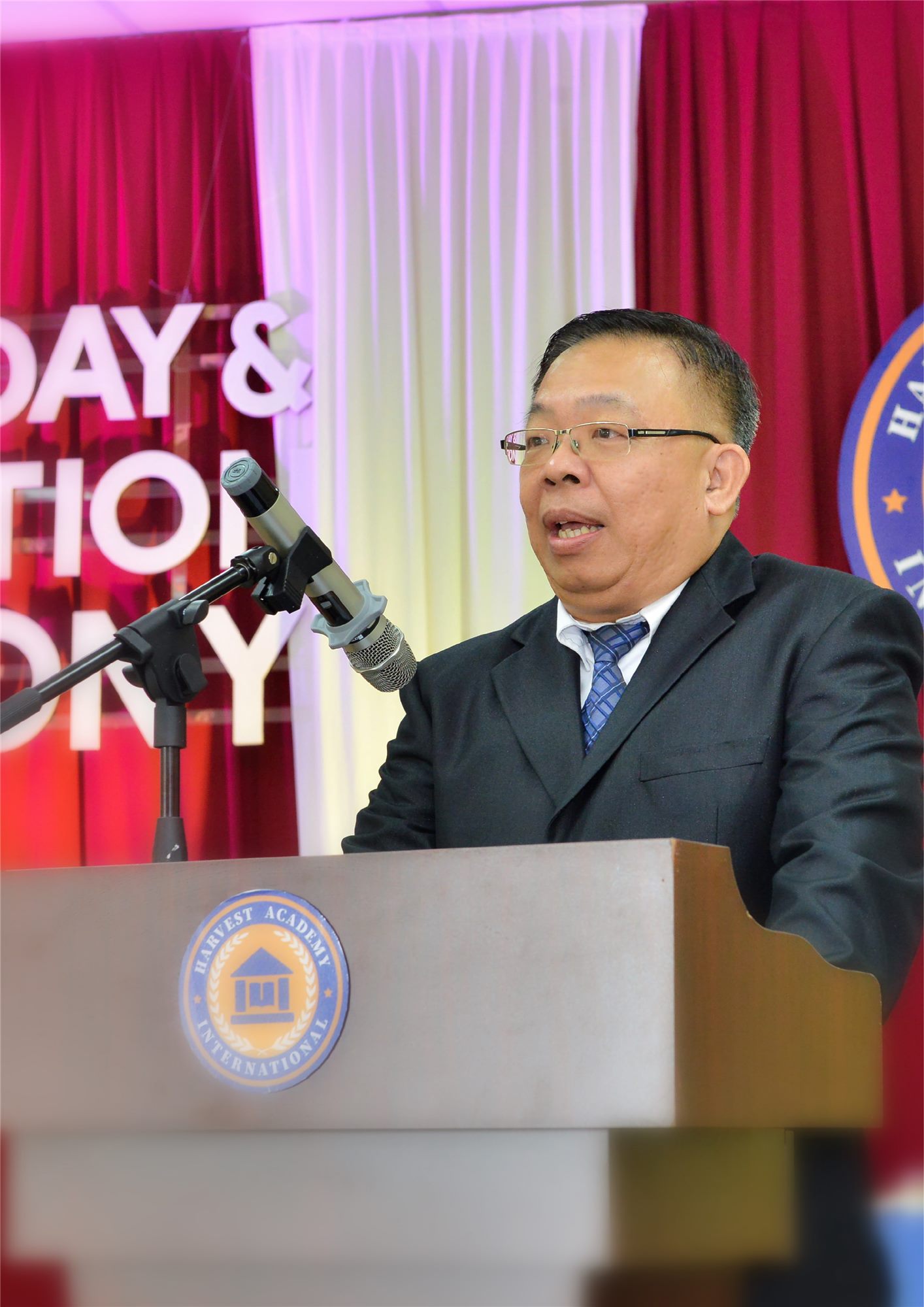 Mr In Chiew Lee, CEO of Harvest Academy Malaysia, speaking at Speech Day