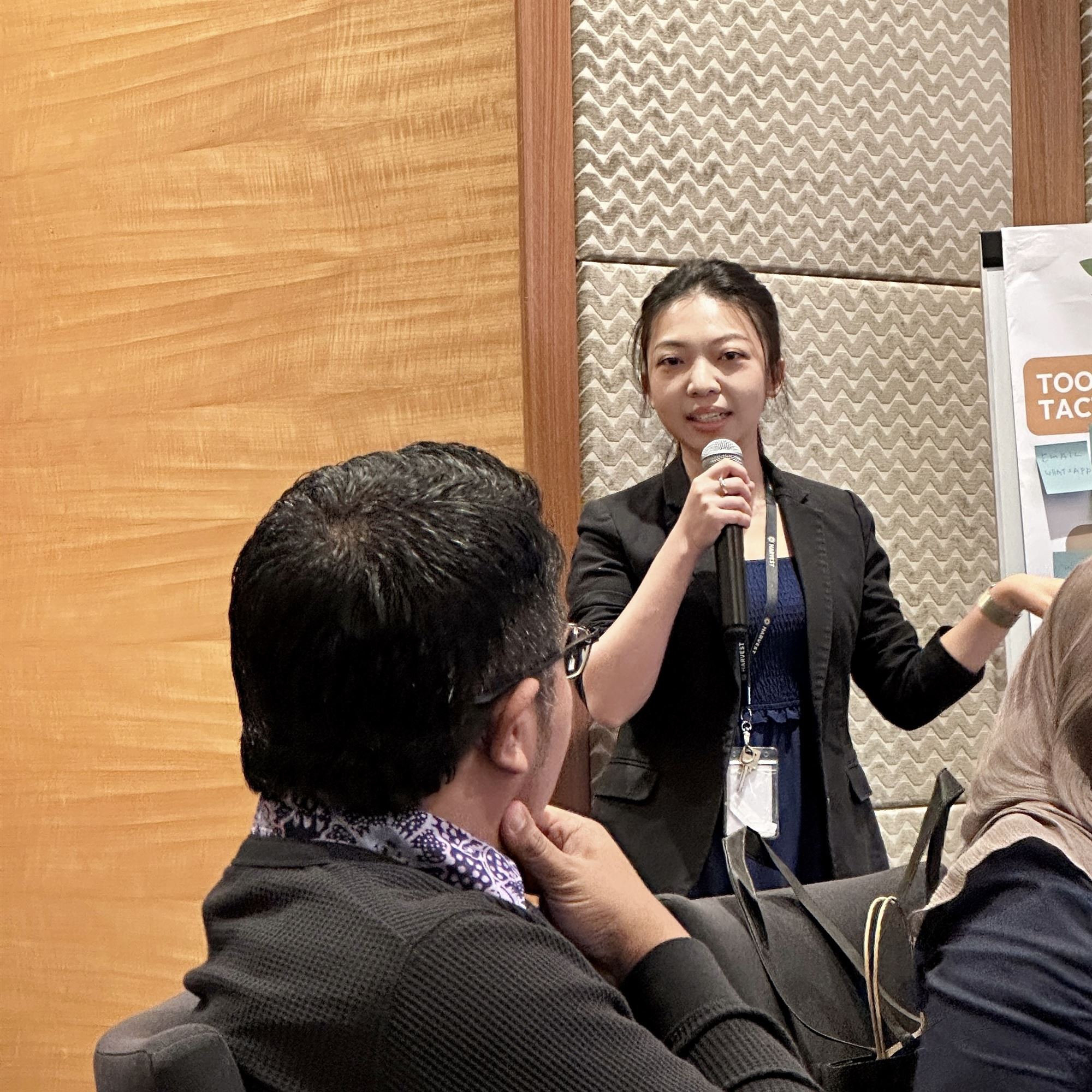 Presenter addressing attendees at the University of Leeds conference
